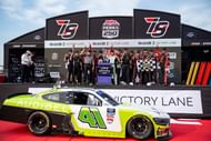 Sam Mayer (41) and crew members celebrate after the NASCAR Xfinity Series Hy-Vee Perks 250 on Aug. 2, 2025, at Iowa Speedway in Newton, Iowa - Source: Imagn